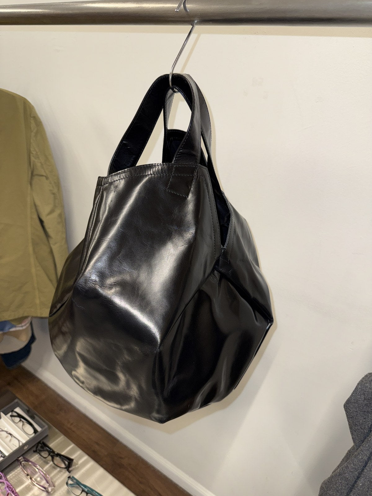 Comme des Garcons leather soccer ball handbag - hanging full front