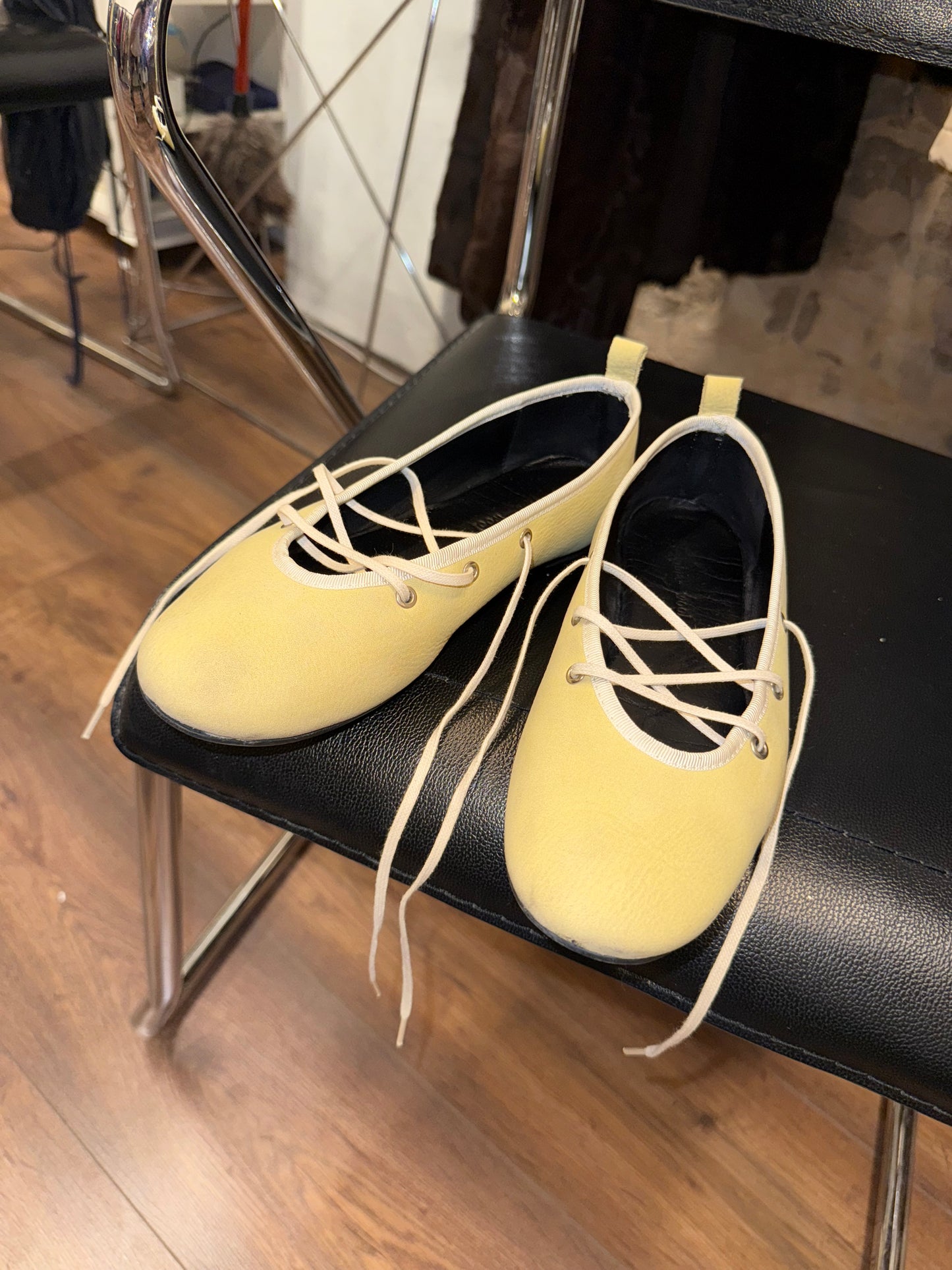 Paloma Wool — soft lemon leather wrap-flats