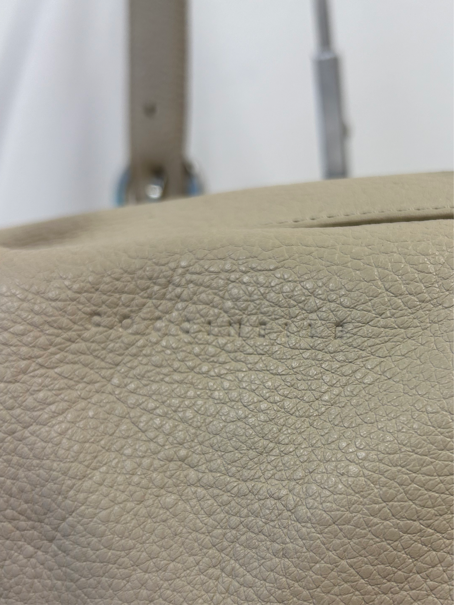 Coccinelle ivory leather baguette bag