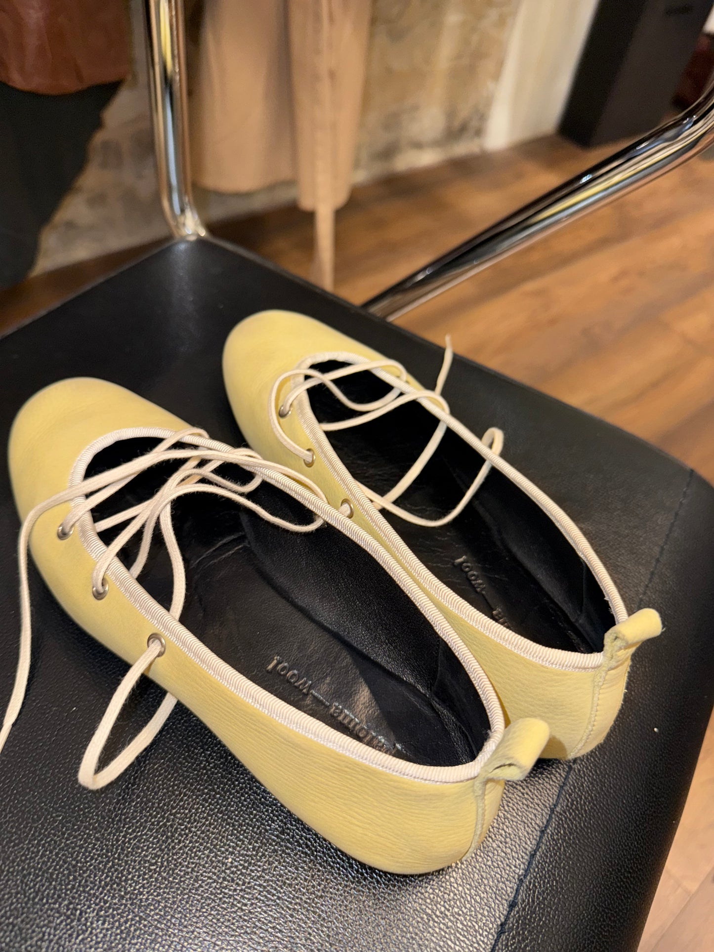 Paloma Wool — soft lemon leather wrap-flats