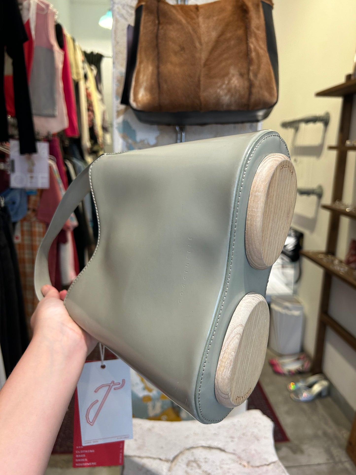 COCCINELLE dull green wooden handbag