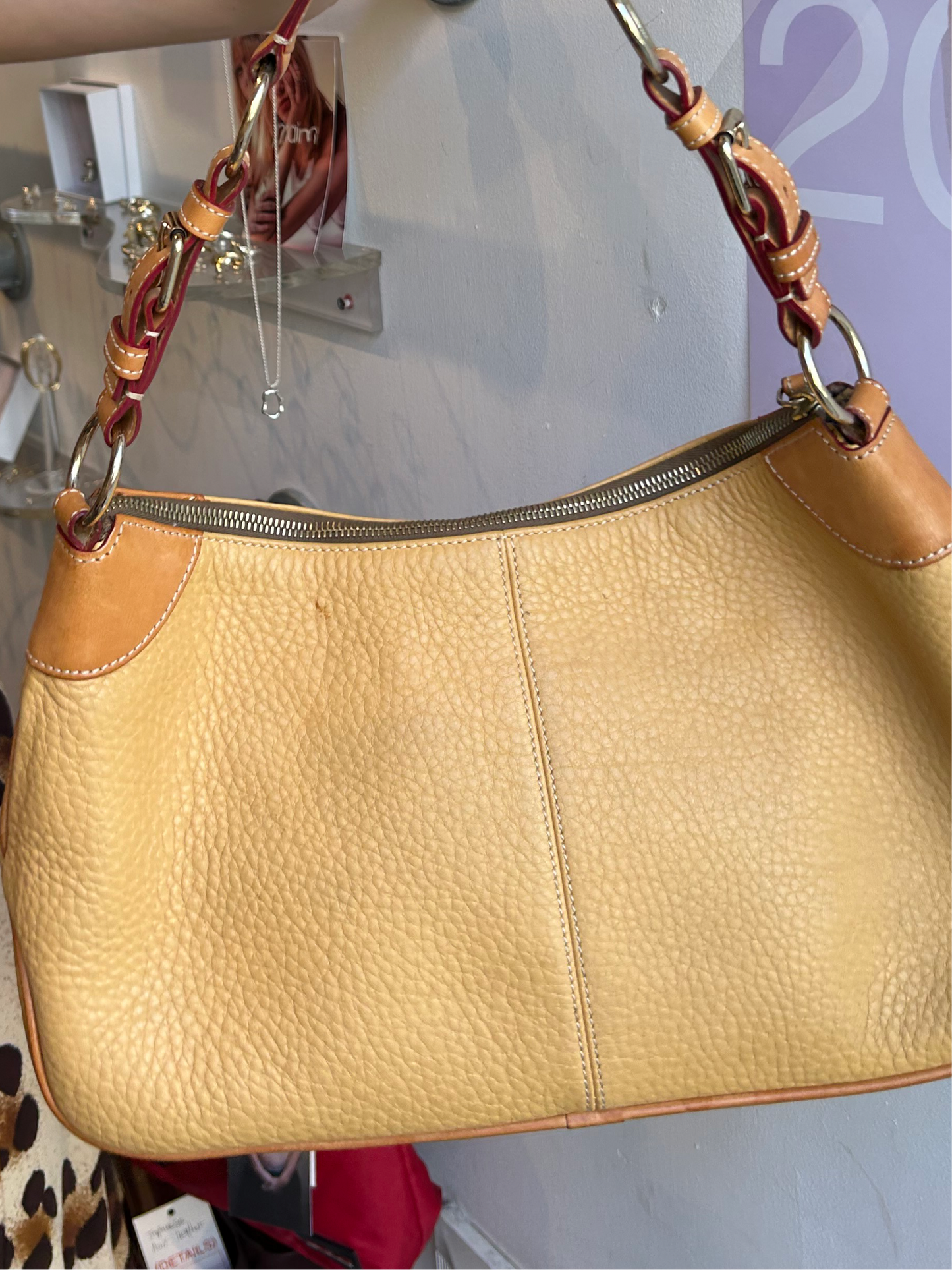 Dooney & Bourke yellowish leather shoulder bag