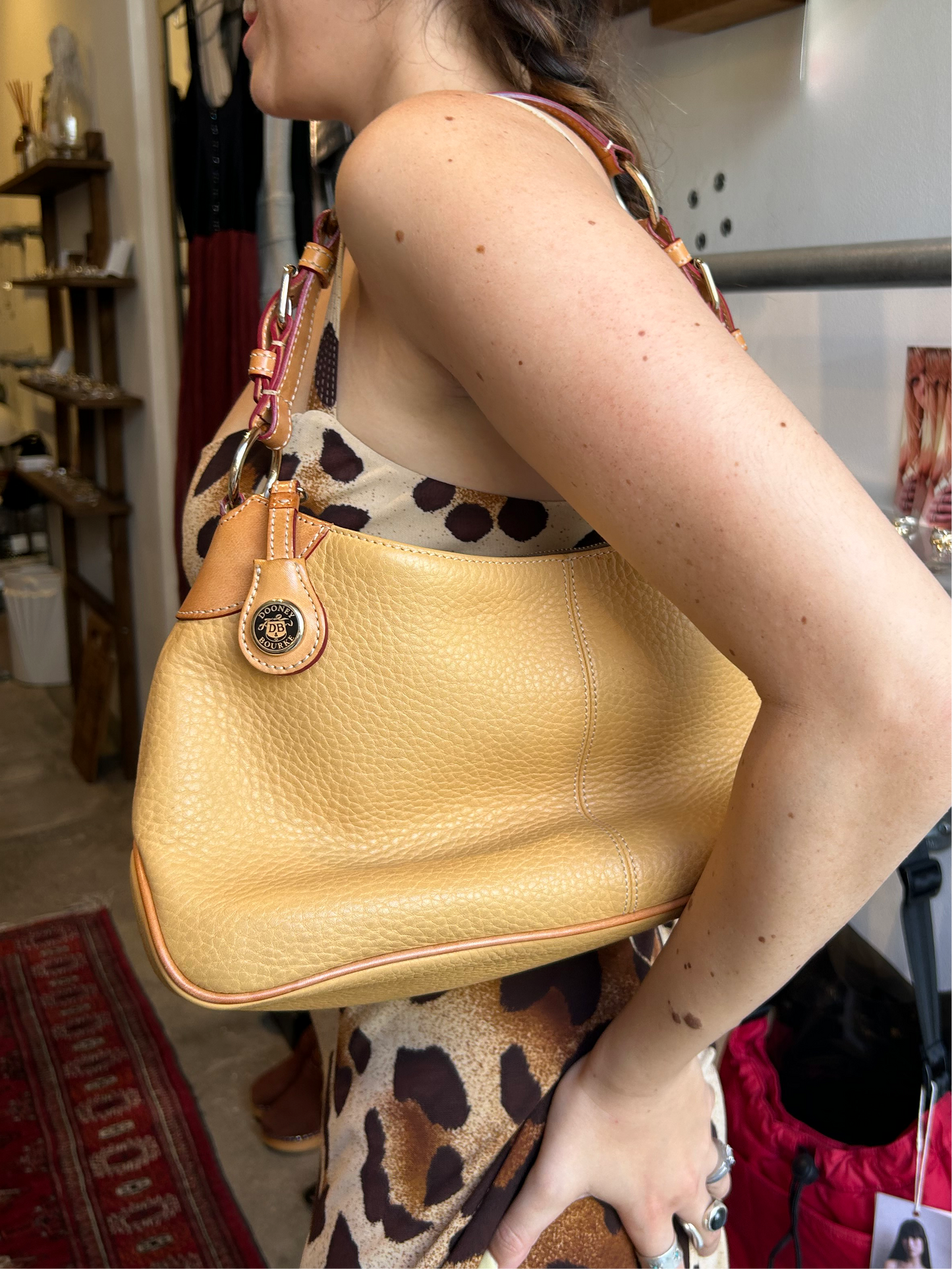 Dooney & Bourke yellowish leather shoulder bag