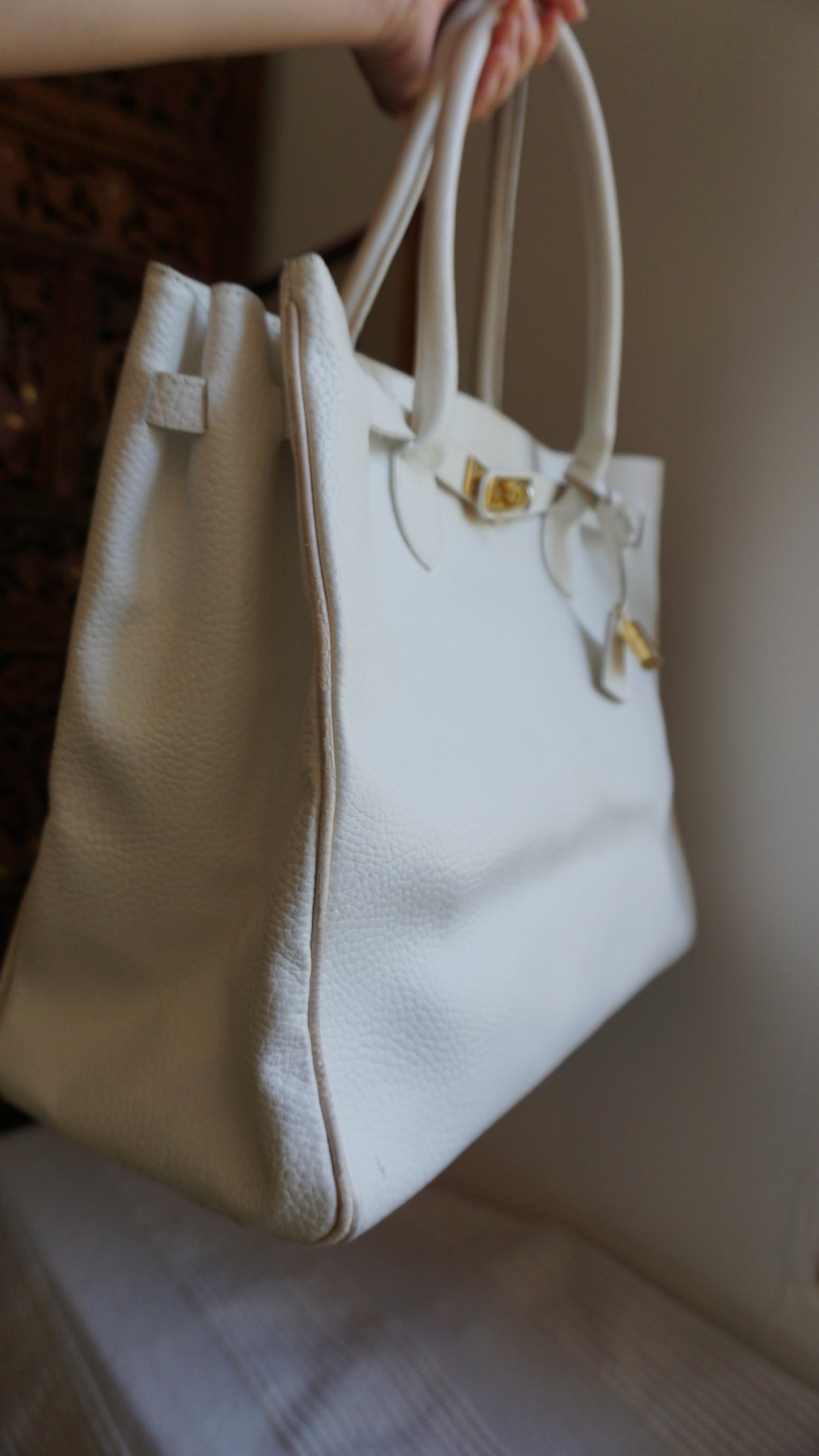 ROGANI white leather shoulder bag