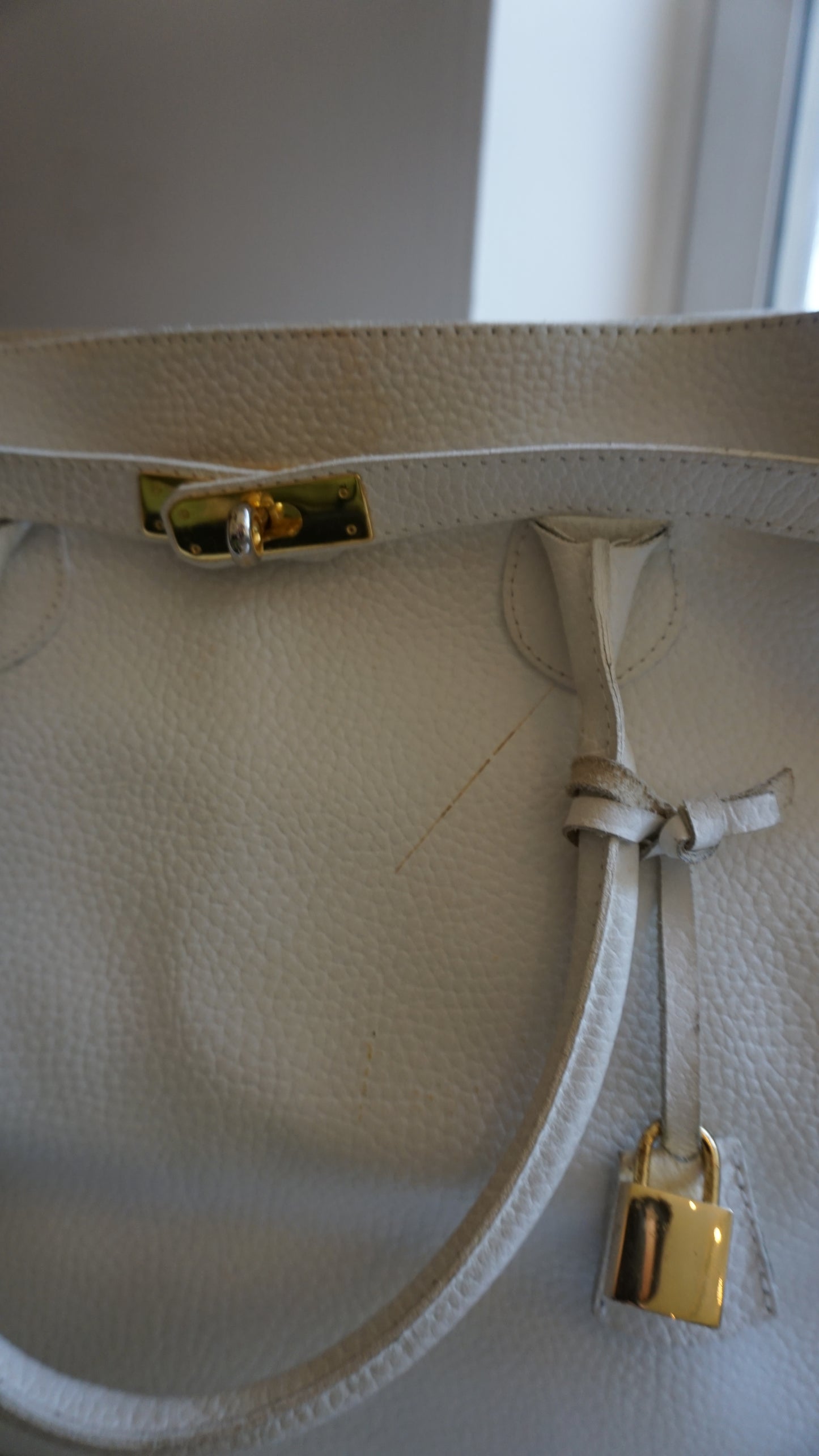 ROGANI white leather shoulder bag