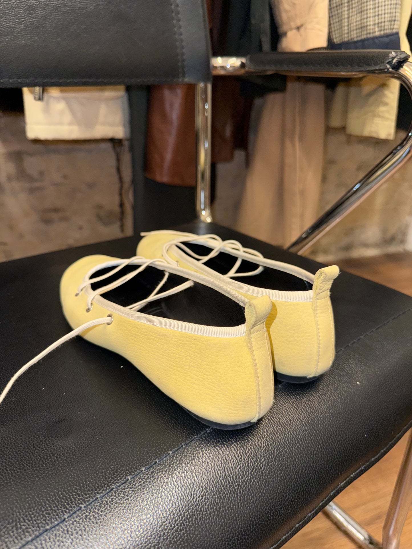 Paloma Wool — soft lemon leather wrap-flats