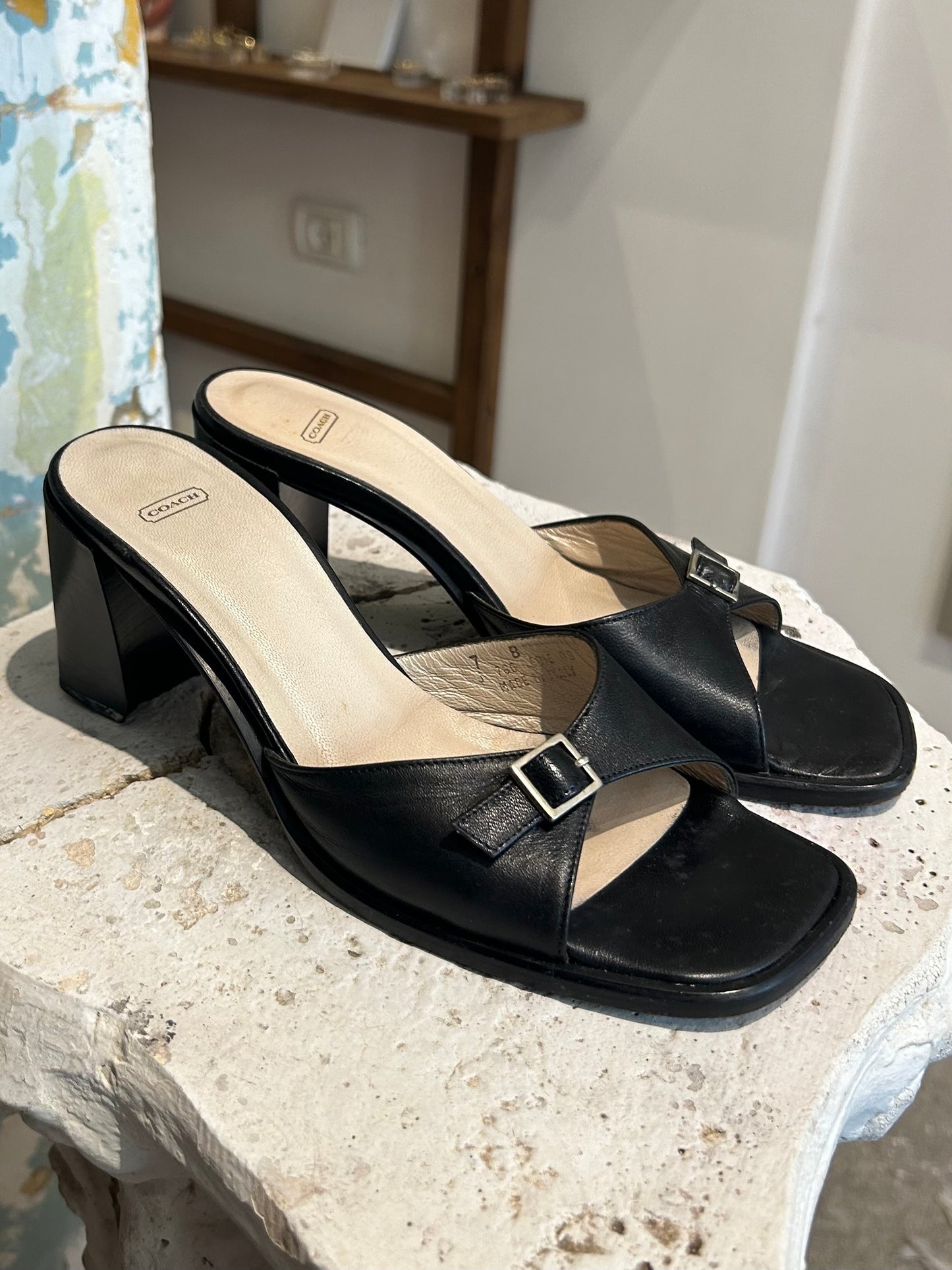 COACH leather buckle pumps