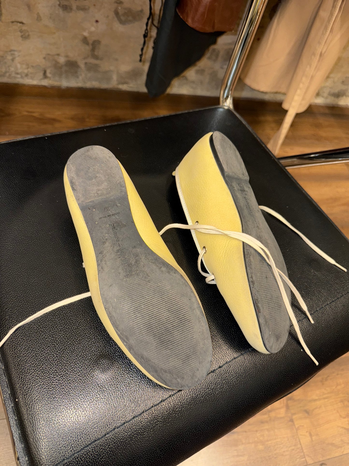 Paloma Wool — soft lemon leather wrap-flats