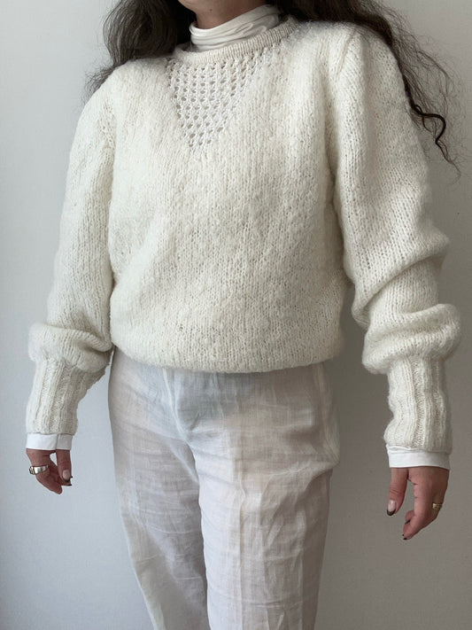 Handmade knitted sweater with holes