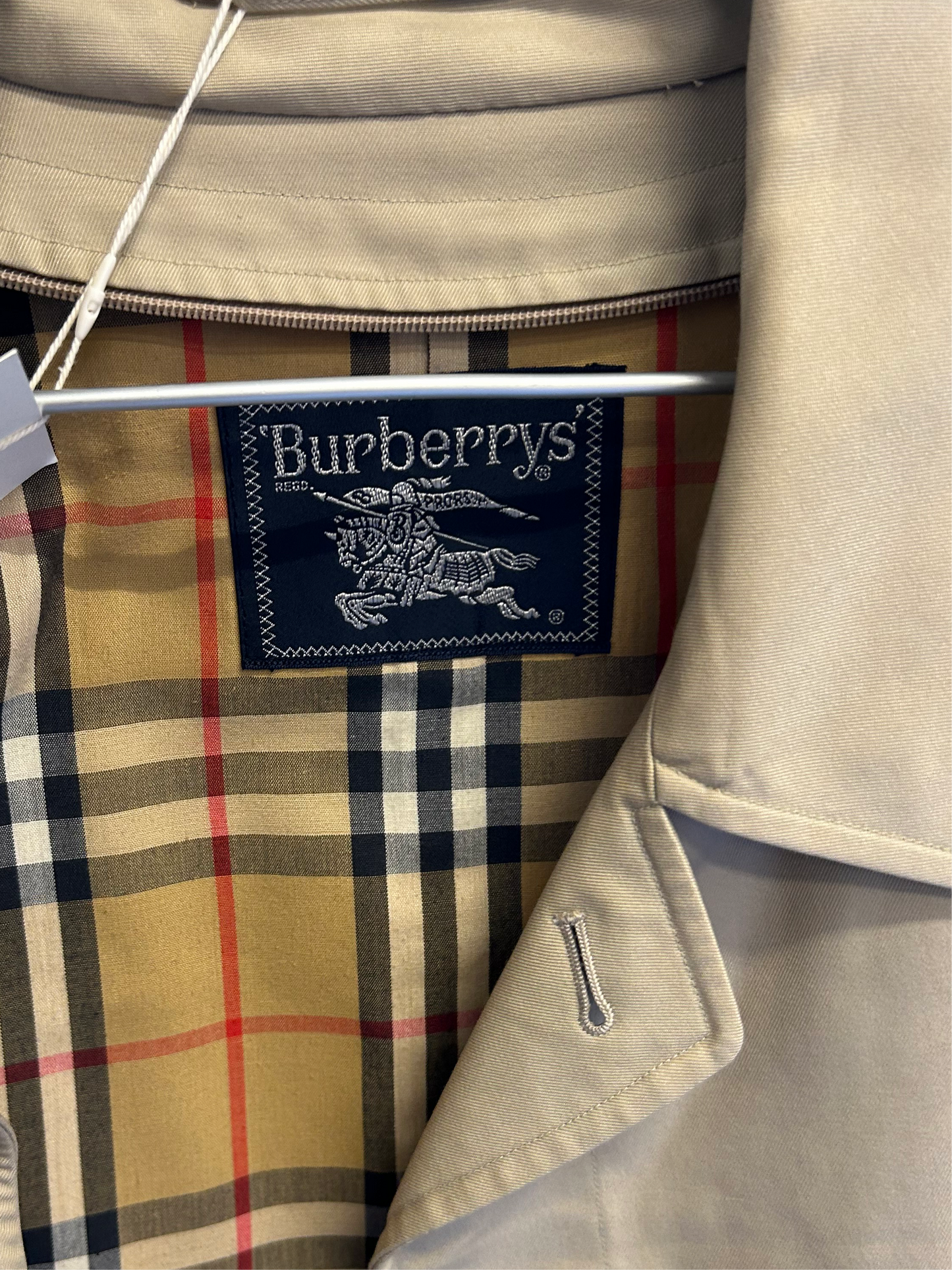 BURBERRY’S classic beige coat