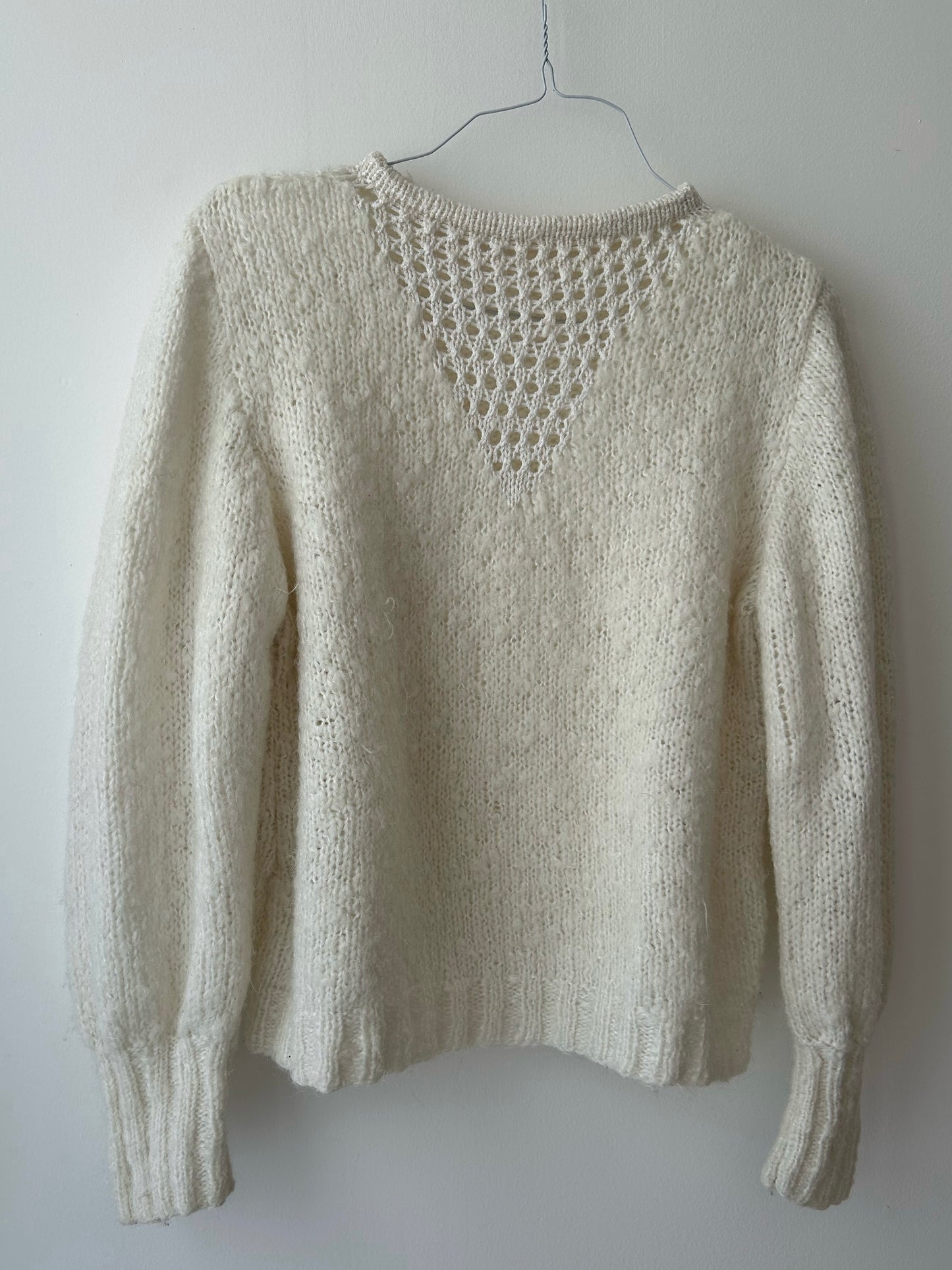 Handmade knitted sweater with holes